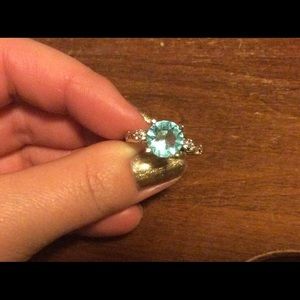 Light blue and clear crystal ring set in silver